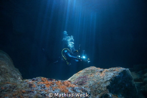 Diver in Urseling Cave / São Jorge / Azores by Mathias Weck 